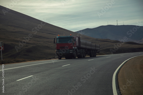 big red truck in road
