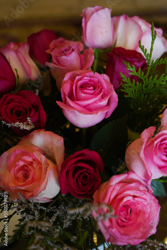 Close-up of passionate pink rose flower on a flower bouquet.