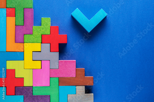 Geometric shapes on a blue background.