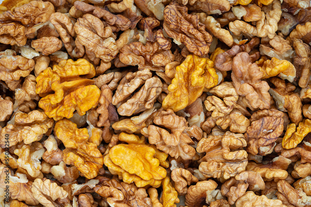 Walnut texture. Peeled kernels background. Walnut texture. Peeled kernels background.