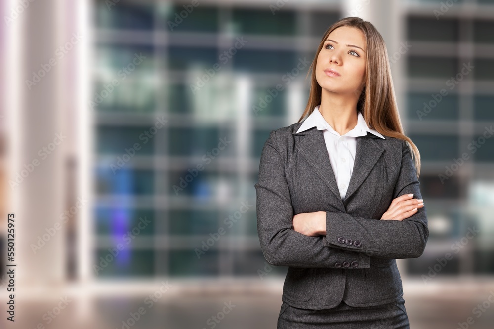 Young happy business woman in busy street Young happy business woman in busy street