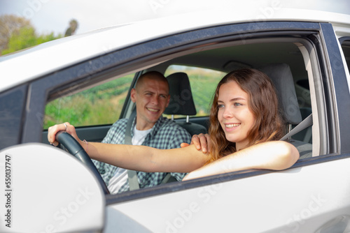 Married couple communicates in the car