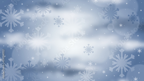 Beautiful blue winter background with falling snow and white blurred snowflakes for christmas holidays.