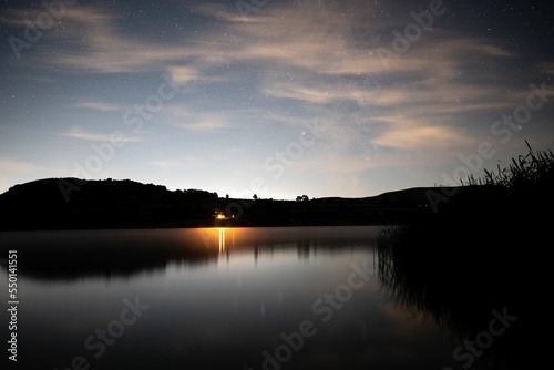 Beautiful view of the Llangorse Lake with the glow of the sunset photo