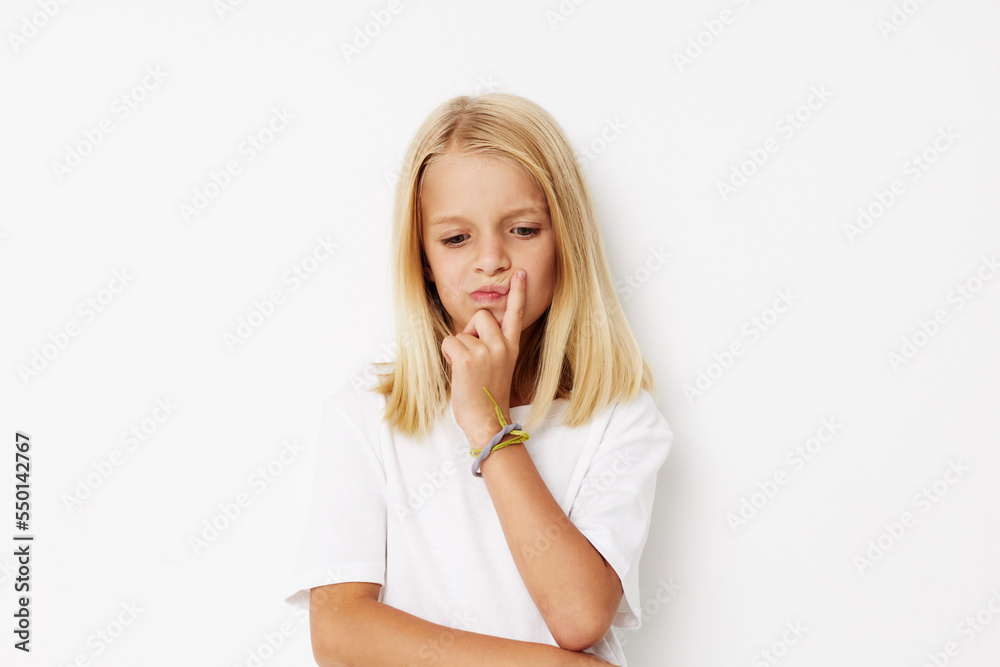 Little cute girl with blond hair posing studio Little cute girl with blond hair posing studio