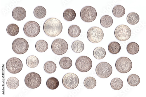 Collection of old Dutch silver coins, mainly guilder (gulden) and 2.5 guilders (rijksdaalder) from around 1950 to 1965, depicting queen Juliana, isolated on white photo