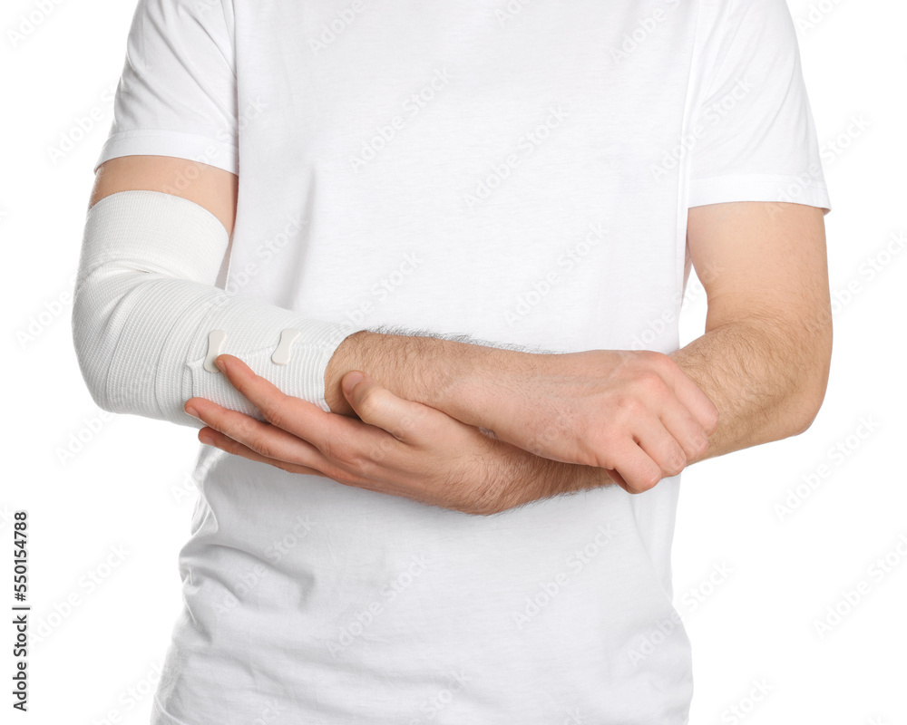 Man with arm wrapped in medical bandage on white background, closeup Man with arm wrapped in medical bandage on white background, closeup