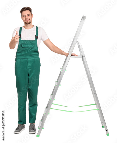 Worker in uniform near metal ladder on white background