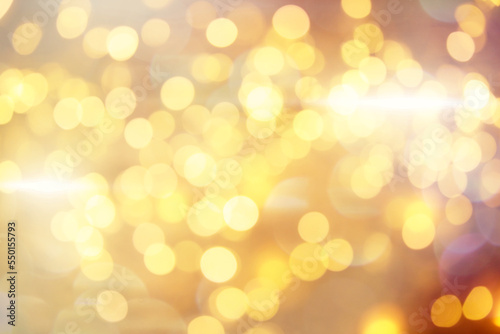 Beautiful abstract background with defocused golden lights
