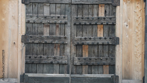 The old wooden Chinese buildings with the sculptures on them 