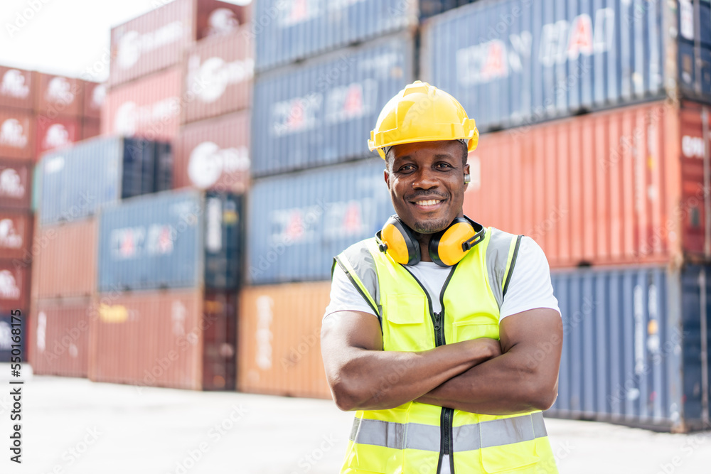 Portrait of Young African American worker work in container termainal. Portrait of Young African American worker work in container termainal.
