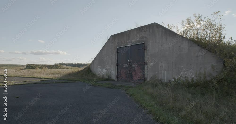 Wide view of steel blast doors of an underground nuclear bunker at the