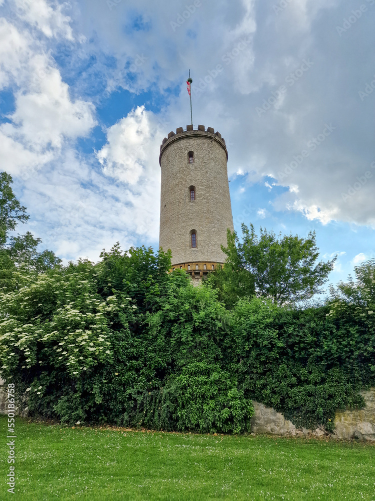 Sparrenburg Bielefeld with tower and walls under a nice cloudy blue sky