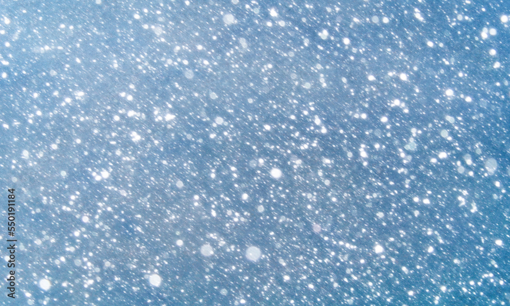 snow winter bokeh glow blue background for Christmas wallpaper