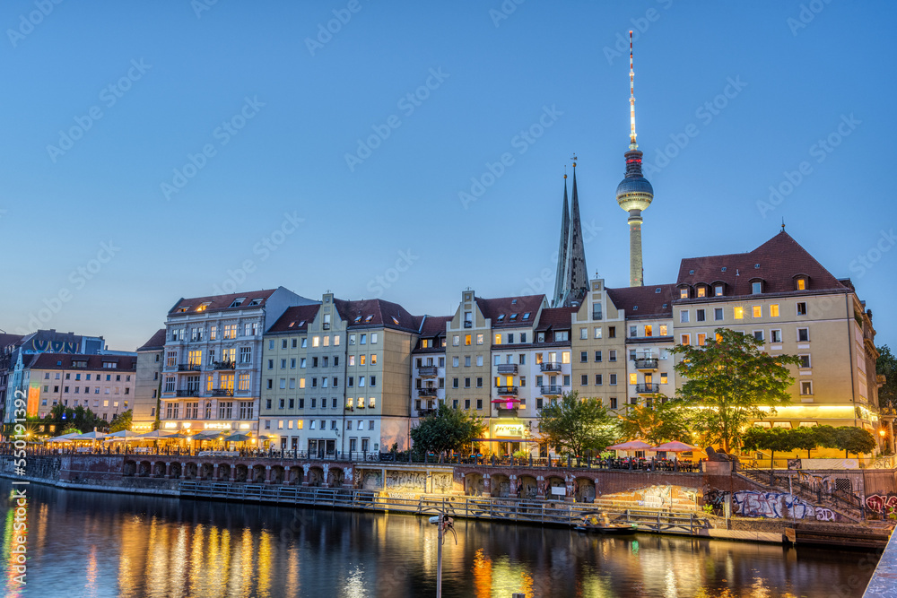 The Nikolaiviertel, the river Spree and the Television Tower in Berlin after sunset