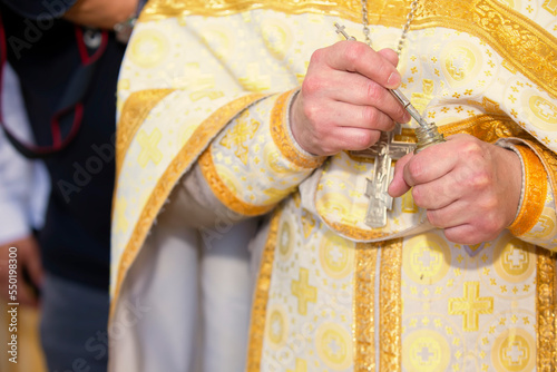 Hands of an Orthodox priest with incense. Faith and religion. photo