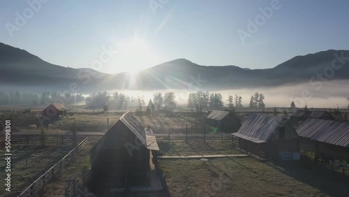 Beautiful aerial view in the morning mist of Hemu village in Xinjiang province, China. photo