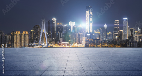 modern building and empty floor with skyline. Panoramic urban architecture  cityscape with space