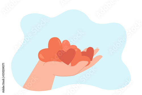 Hand of person holding red comic hearts. Human hand with hearts as symbols of donation, gift or love flat vector illustration. Romance, Valentine day, charity concept for banner or landing web page