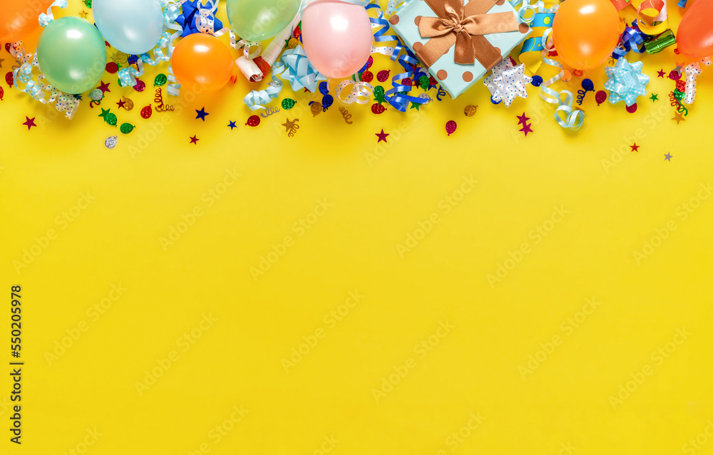 Birthday background top view. Balloons and various party decorations on