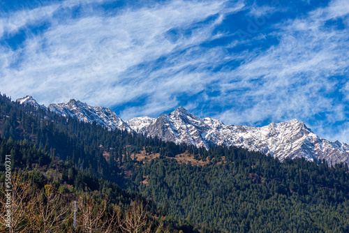 Manali in Himachal Pradesh. Panoramic views of Himalayas. Natural beauty of Solang Valley in India. Famous tourist place for travel, honeymoon destination in India set on Beas river. Rohtang Pass Snow © Parvesh