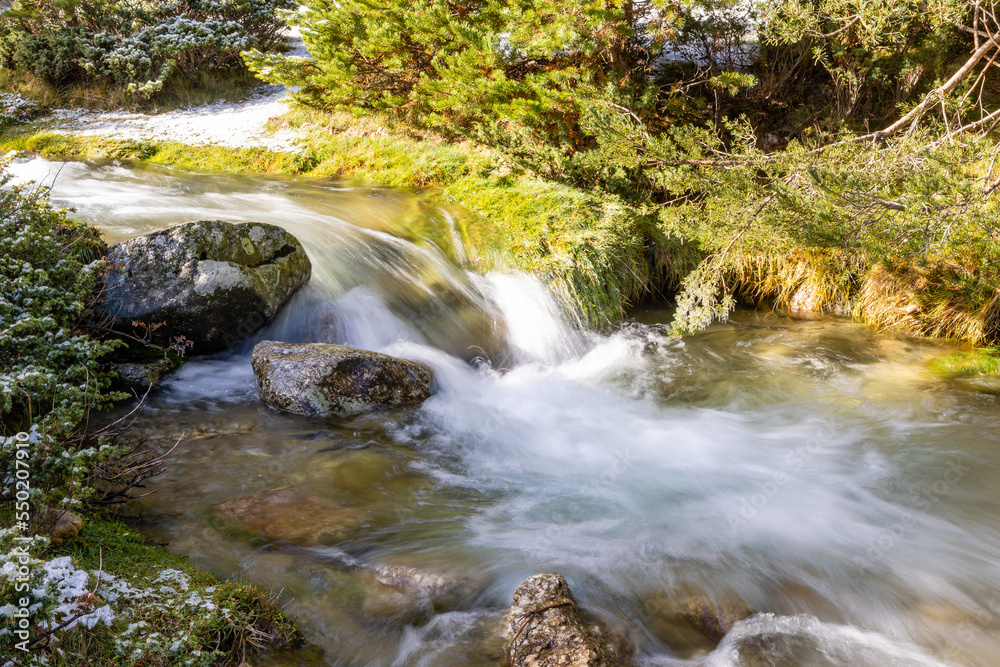 slightly snowy stream in the mountains of the Sierra de Guadarrama in Madrid with the first snow of the year 2022 slightly snowy stream in the mountains of the Sierra de Guadarrama in Madrid with the first snow of the year 2022