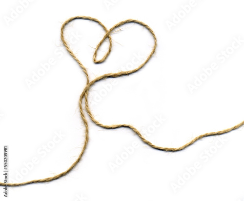 Heart silhouette made with packing twine. Love and connection symbol isolated on white. Frame with copy space