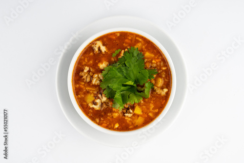 soup with grits on a white background