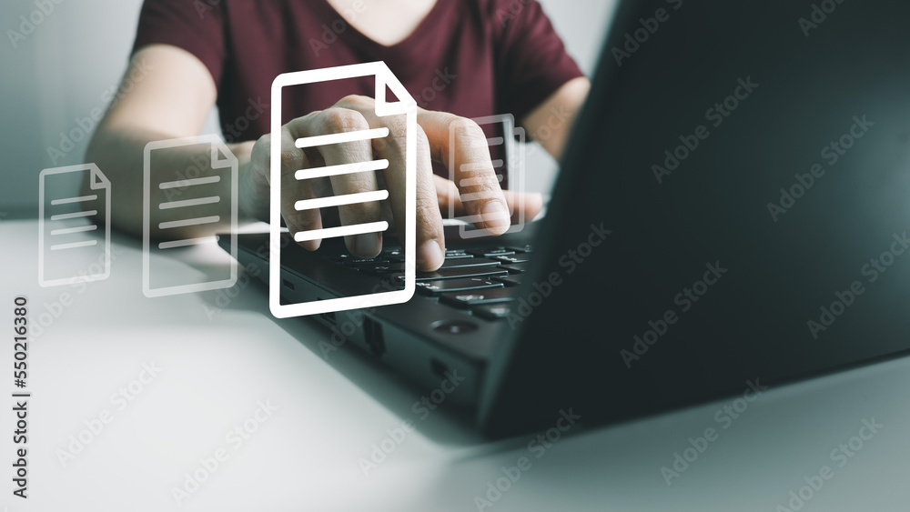 Obraz premium Officer using laptop manage files, Document Management System (DMS), Online document database management, automated processes to manage system, ERP enterprise efficient, business technology.