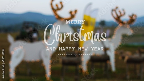 christmas message There is a blurred background with orange bokeh lights. for background images