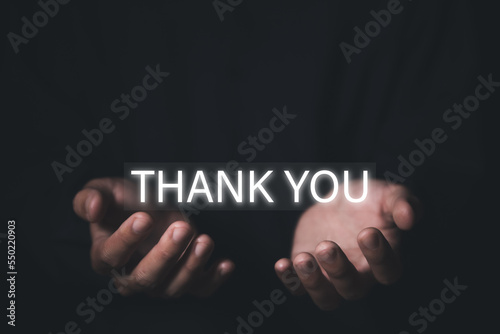 Canvas Print The businessman's hand shows the message. Words thank you.