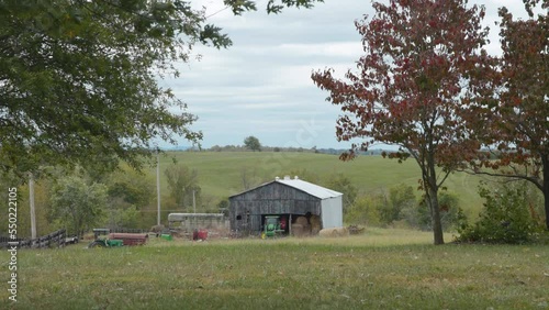 Lone barn in a field photo