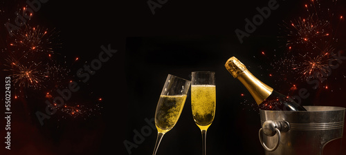 HAPPY NEW YEAR 2024 celebration holiday greeting card background banner panorama - Champagne or sparkling wine bottles, bucket and toasting clink glasses, firework in the night sky