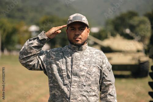 Fotobehang Asian man special forces soldier saluting standing against on the field Mission
