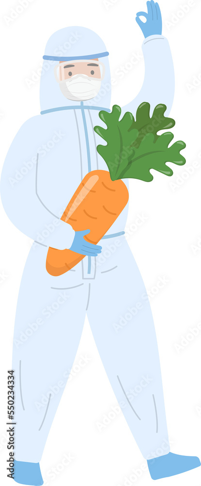 Paramedic or doctor or nurse wearing isolation gown showing ok gesture with carrot or agricultural product Paramedic or doctor or nurse wearing isolation gown showing ok gesture with carrot or agricultural product