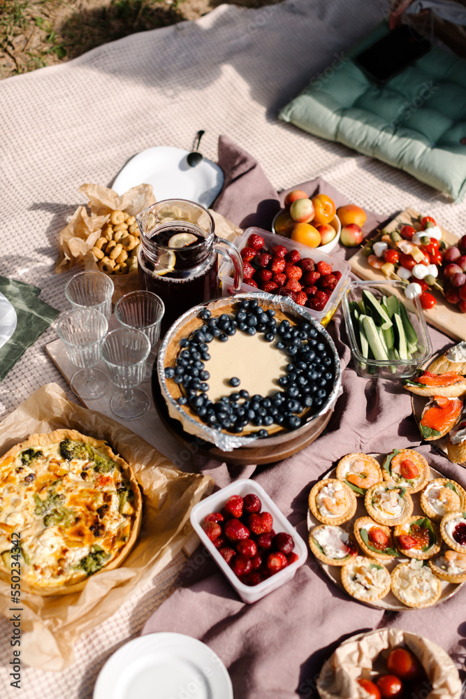 Rest on a picnic with a funeral mood. Picnic food in nature. High quality photo Rest on a picnic with a funeral mood. Picnic food in nature. High quality photo