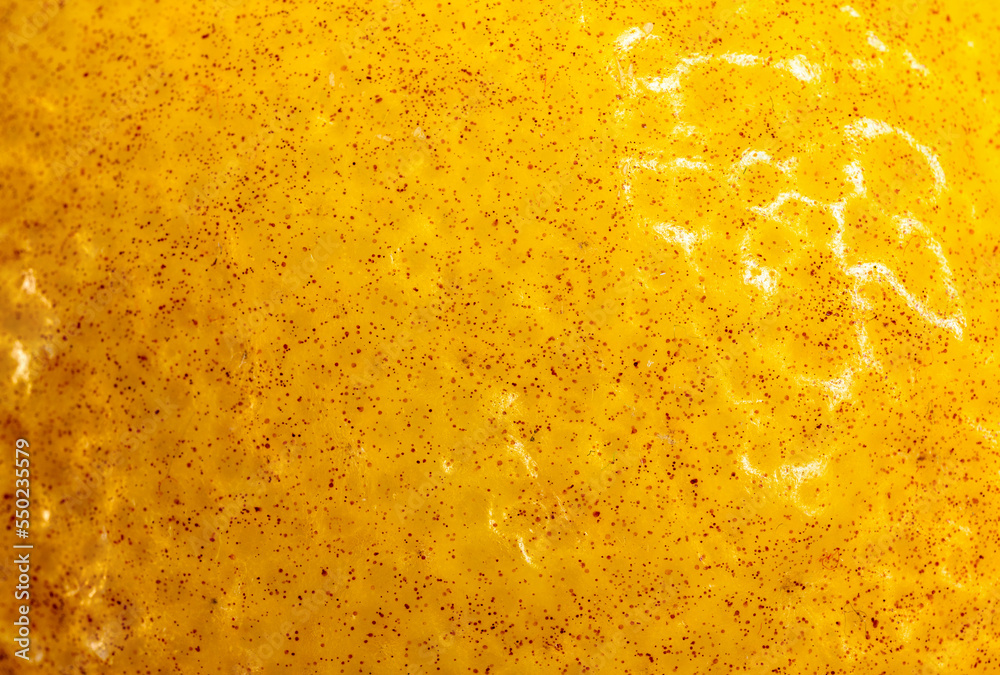 Yellow lemon peel, macro photo of food. High-resolution texture. Yellow lemon peel, macro photo of food. High-resolution texture.