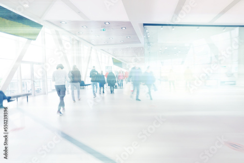 blurry abstract business background blue movement people concept inside © kichigin19