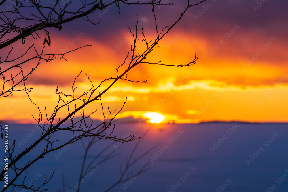 Fototapeta premium Dramatic winter sky at sunset. Pörkenäs, Finland
