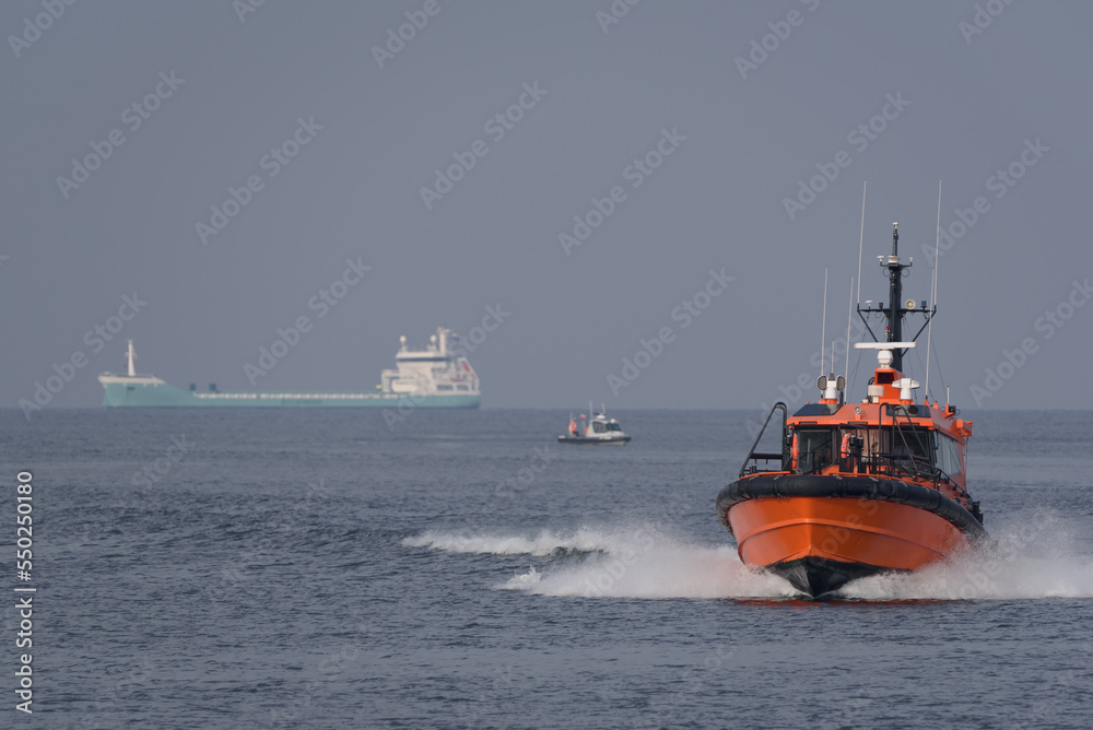 MARITIME TRANSPORT - The pilot boat is sailing on sea