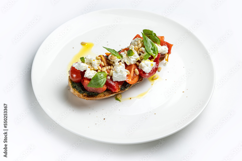 delicious bruschetta with cheese, meat, vegetables in a restaurant
delicious bruschetta with cheese, meat, vegetables in a restaurant