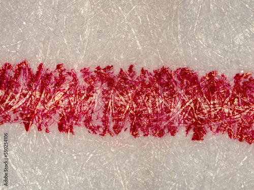 Fototapet red ballpoint pen stroke on a sheet of paper under the microscope - with optical