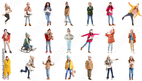 Group of stylish little children in winter clothes on white background