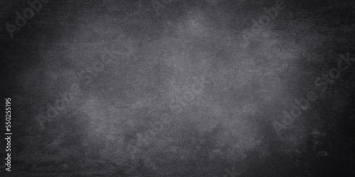 Black chalkboard background with marbled texture