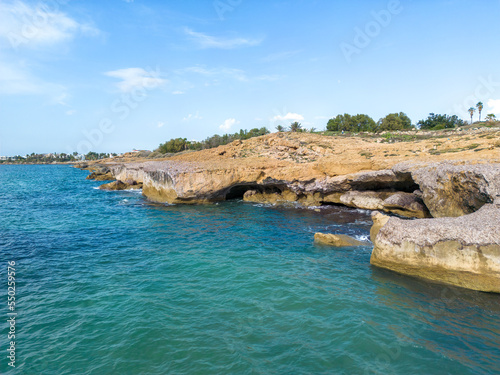 The coastline of Cyprus in the Paphos region. Eroded rocks and sea caves