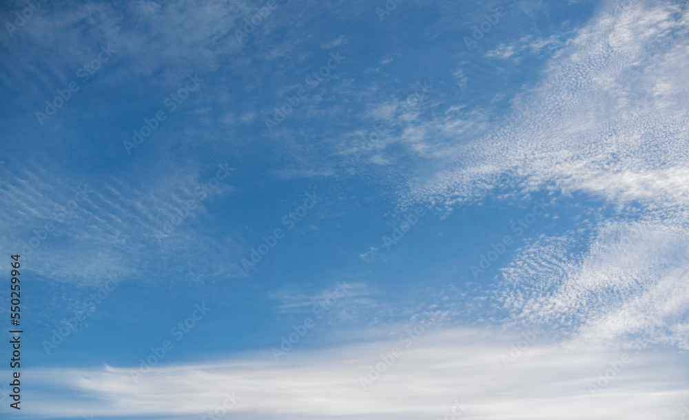 White clouds against a blue sky