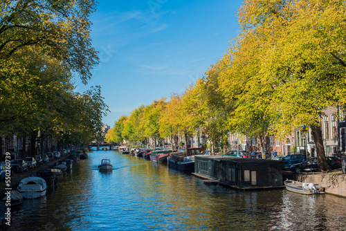 autumn and city canal houses in Amsterdam  © Alena Petrachkova