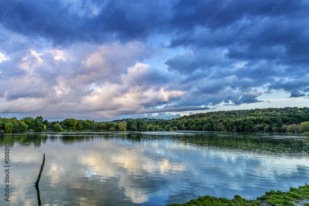 Treeton Dyke, clouds over the lake