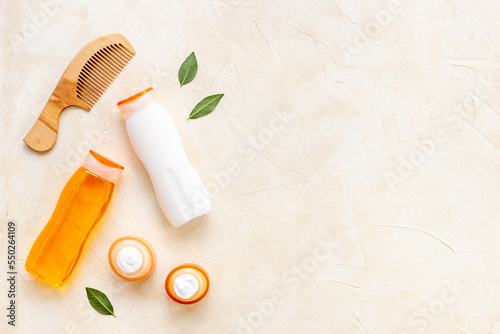 Flat lay of hair care and styling products, top view