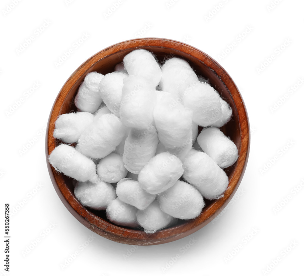 Bowl of soft cotton balls on light background Bowl of soft cotton balls on light background